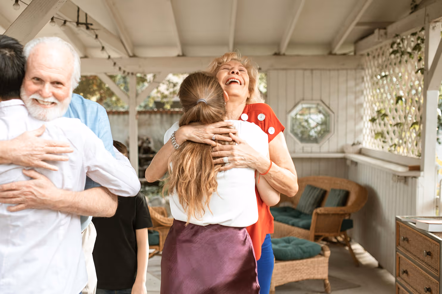 Elderly family sharing hugs